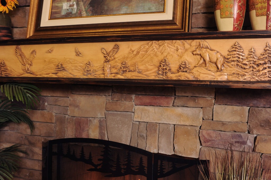 Wildlife Chorus fireplace mantel with 8 point buck and eagle mountain scene.