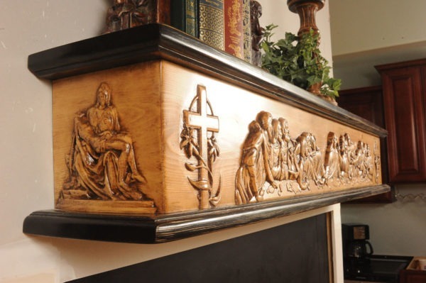 The Last Supper fireplace mantel shown with side carving option.