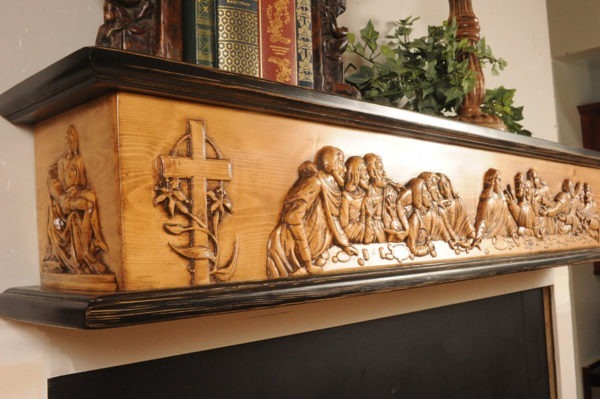 Closeup view of The Last Supper Fireplace Mantel. Also showing side carving.