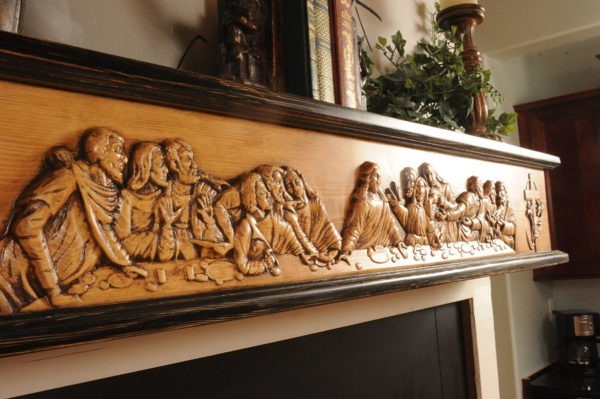 Closeup view of The Last Supper Fireplace Mantel.