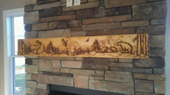 Bear & cubs fireplace mantel installed in Fayetteville, North Carolina